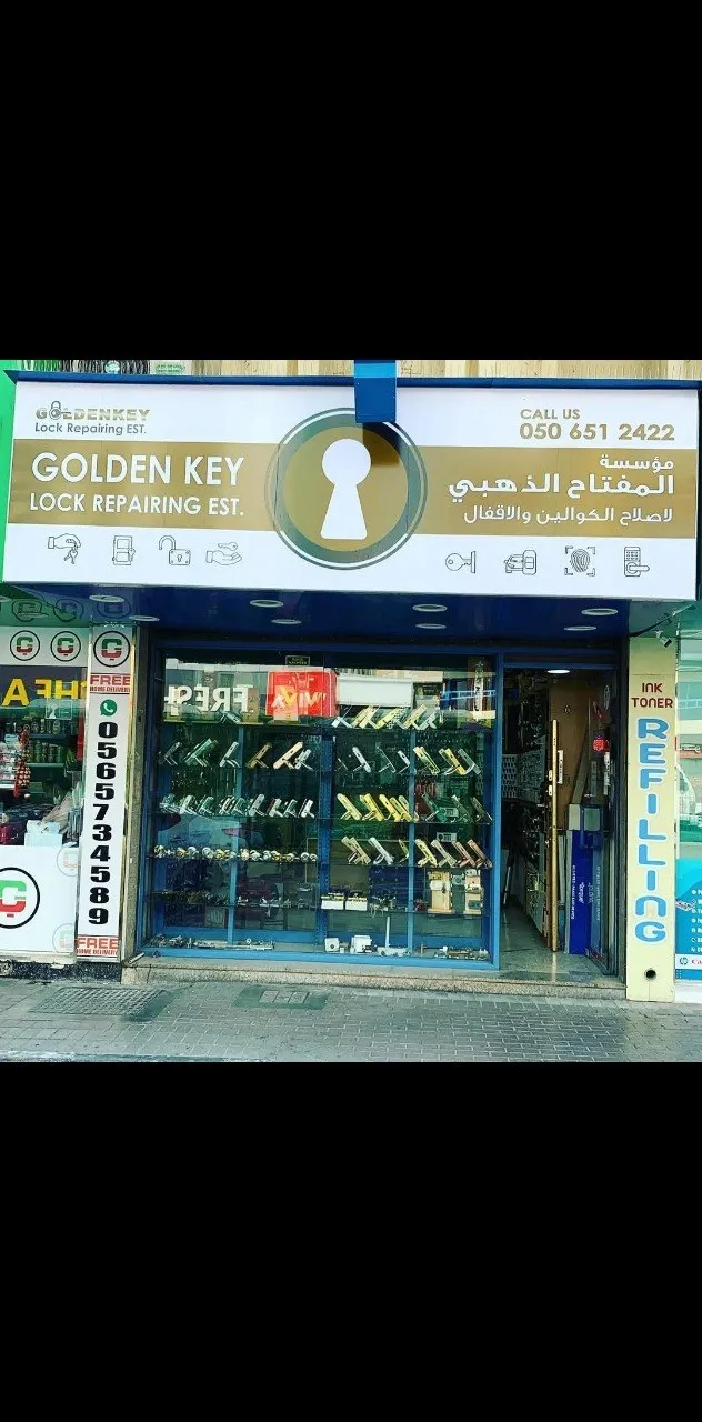 Golden Key Locks Repairing Establishment storefront with signage showing phone number 050 651 2422 in Al Karama, Dubai